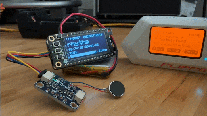 Adafruit TFT device with a little module attached by wires and a smaller disc attached to that. Flipper Zero to the right side with "BT Settings Flood" displayed on the screen.